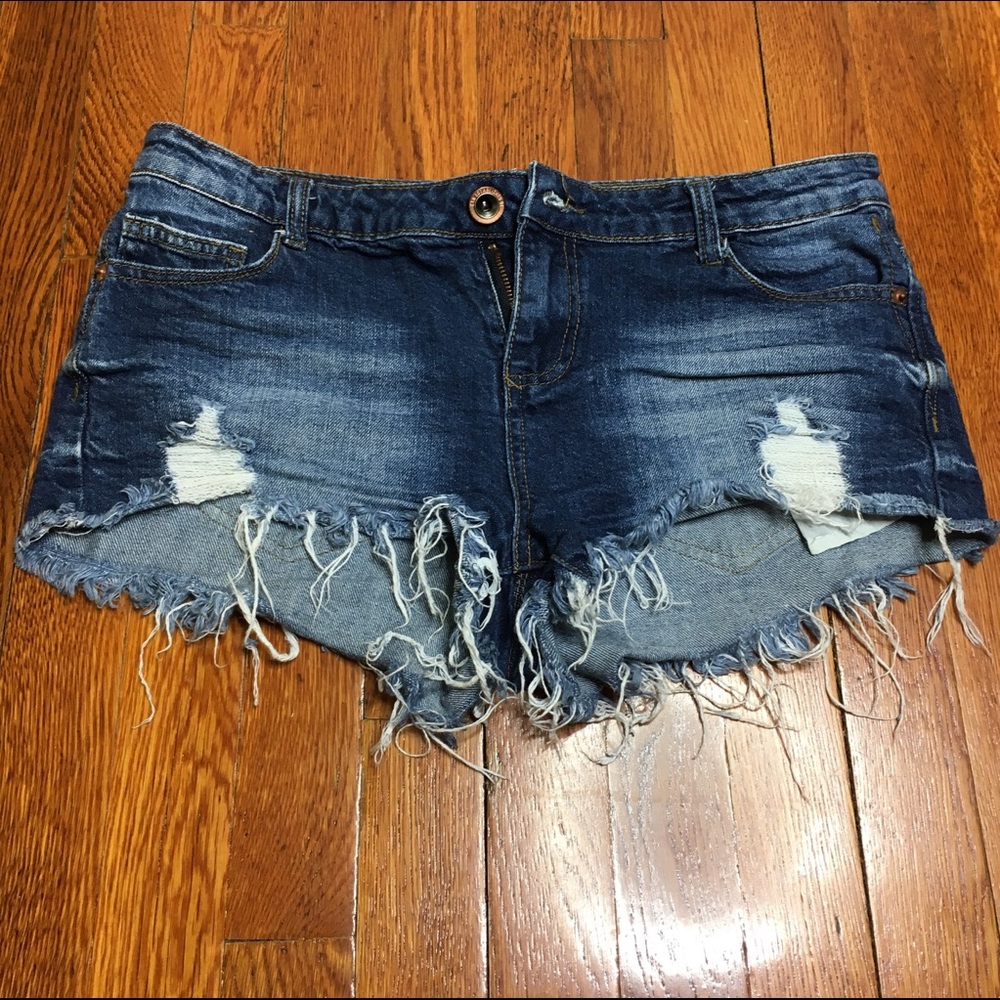Distressed denim shorts